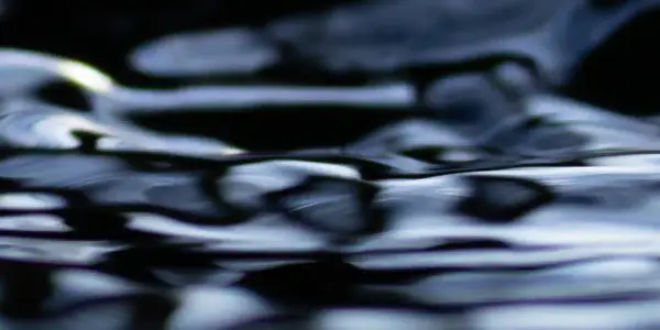 Ripple effect created by the mixing of sound waves and water.