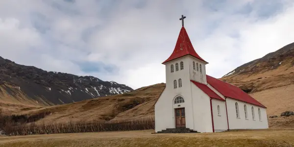 A Church, one of many identicle ones in Iceland. Surrounded by a large plateau.