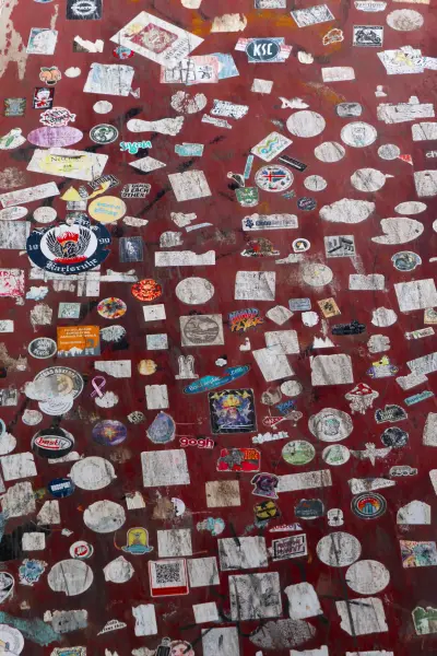 A Group of stickers stucken to a old bridge in the middle of soutern iceland. Reperesenting all that have been there.