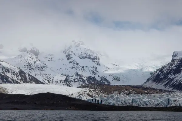 A group of strangers looking at the battle ahead. One of the tallest mountains in Iceland.