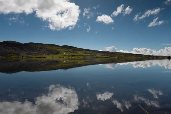 A relective lake In Iceland On a sunny spring day.