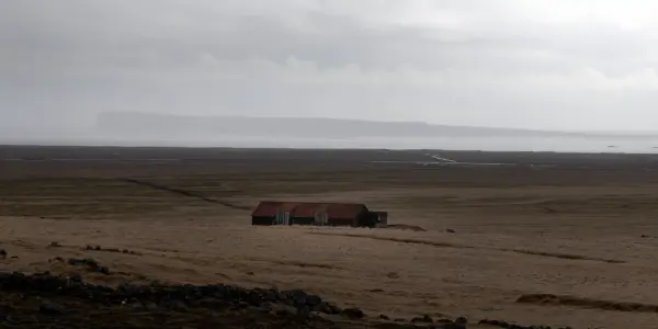 A lonely abandoned barnhouse in the plains of south Iceland.