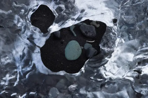A Unique Rock Laying in a washed up glacier on Dimond Beach - Iceland