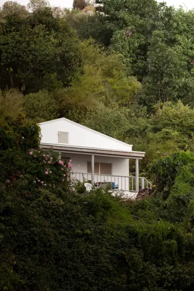 Small House on the coast of a Island in the BVI. Sheltered by greenery.